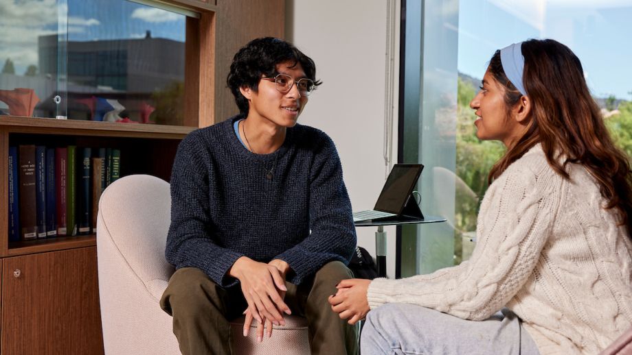Students talking to each other in support of one another.