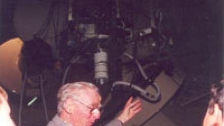 Hermann Wehner shows visitors through the Exploratory, 1990s (Mt Stromlo Archives)