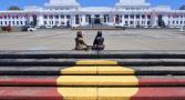 An painting of the Aboriginal flag opposite Old Parliament House, Canberra.